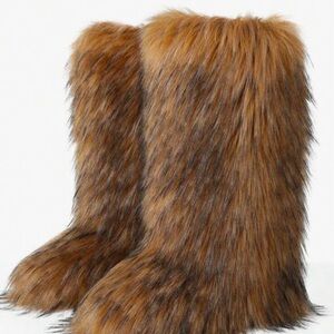 Brown knee high fur boots y2k. Never worn/ used. Still in packaging. Size 7.5